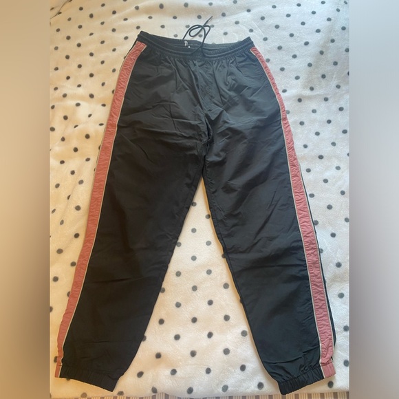 Urban Outfitters black with pink stripe pants size medium. - Picture 1 of 3